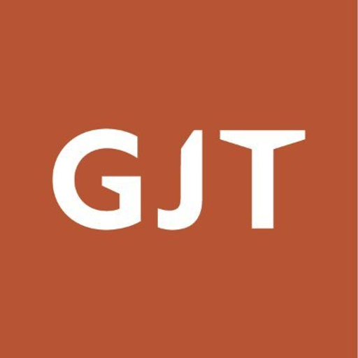 Grand Junction Regional Airport logo features an airplane silhouette against a red and orange background representing the