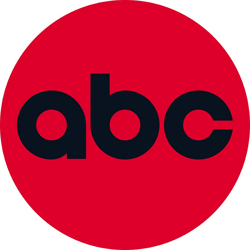 A black logo featuring ABC Home Furnishings Inc in bold lettering against a solid red background indicating a home