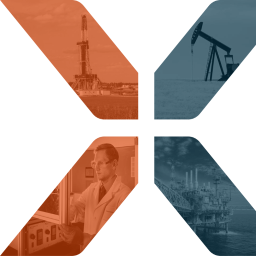 A man in a white lab coat examines a complex control panel inside an offshore oil rig structure