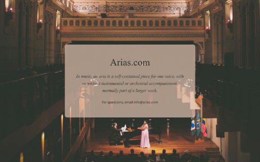A pianist performs on a stage within a grand concert hall with an orchestra seated in the background
