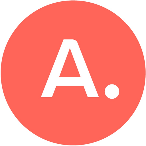 A white logo featuring a red circle with a white dot inside represents an article or content brand