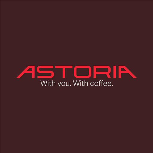 A stylized logo featuring Astoria Trade Inc in a dark red color with a distinct modern font design