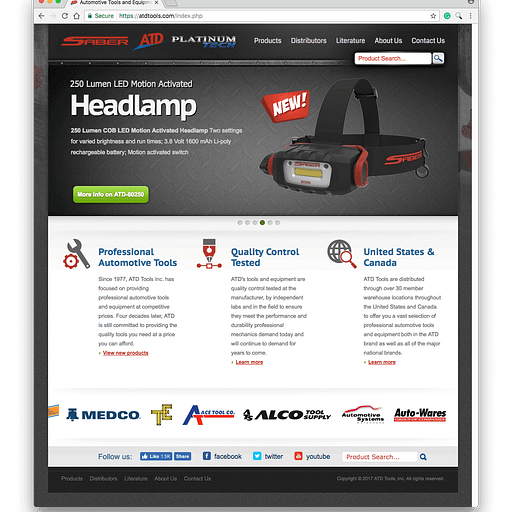 Heres a description of the image A bright LED flashlight from ATD Tools Inc illuminates a workspace with a wrench and tools