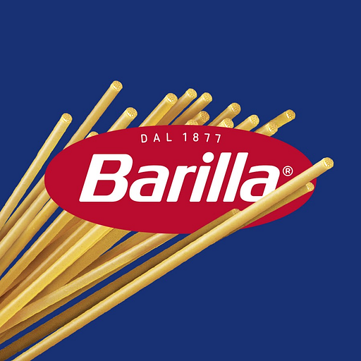 A bundle of yellow pasta sticks with the Barilla America Inc logo prominently displayed in the background