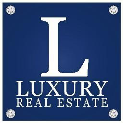 The Luxury Island Inc logo displays a dark blue background featuring a stylized gold diamond emblem representing the brands