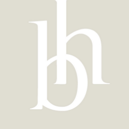 The Bush Industries Inc logo depicts a stylized industrial design with a prominent blue and white color scheme for brand