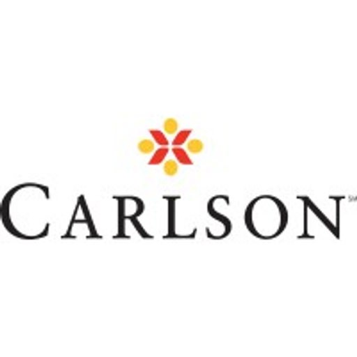 The Carlson warehouse logo a white stylized building with a red roof against a blue background
