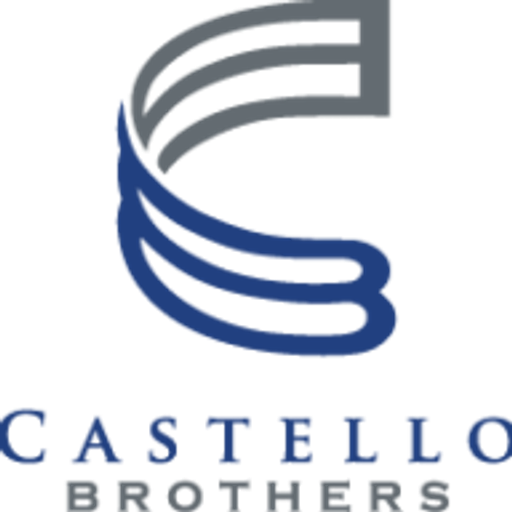 A stylized blue volume manufacturing cost logo with a prominent geometric design depicting a rotating cube symbol