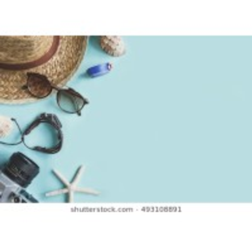 A straw hat rests on a light blue background with sunglasses and a starfish detailed accessories