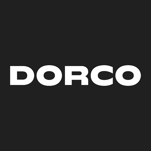 Dorco USA Inc logo depicting a stylized shield with the company name in white against a blue background