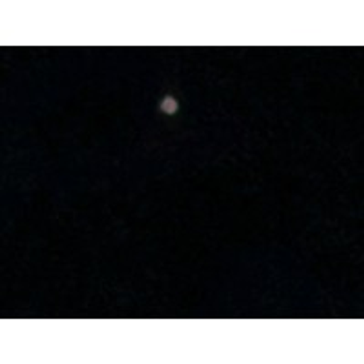 Dark night sky with a bright moon prominently visible offering a beautiful celestial display