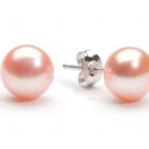 A set of glossy iridescent pearl earrings features a pinktoned pearl with a subtle sheen and silver earring posts