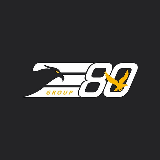 A stylized golden eagle flies upward against a white background representing Group Incs logo