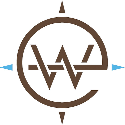 A stylized logo depicts a compass rose with blue directional arrows surrounding a brown circular shape representing east and