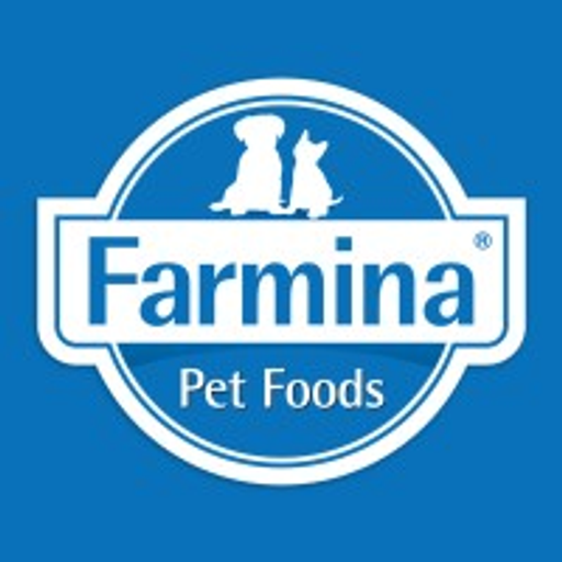 A white cat sits prominently on a blue farmina pet foods logo background conveying a premium pet food brand