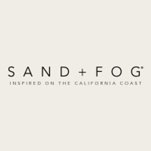 A stylized logo featuring the words sand fog in a simple sansserif font with a muted color palette suggests a brand related